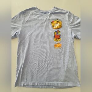 Nike Sky Blue Tee with Vibrant Graphic
